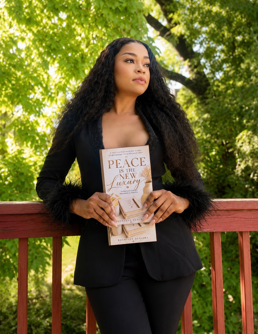Rachelle Aurisma holding Peace Is the New Luxury