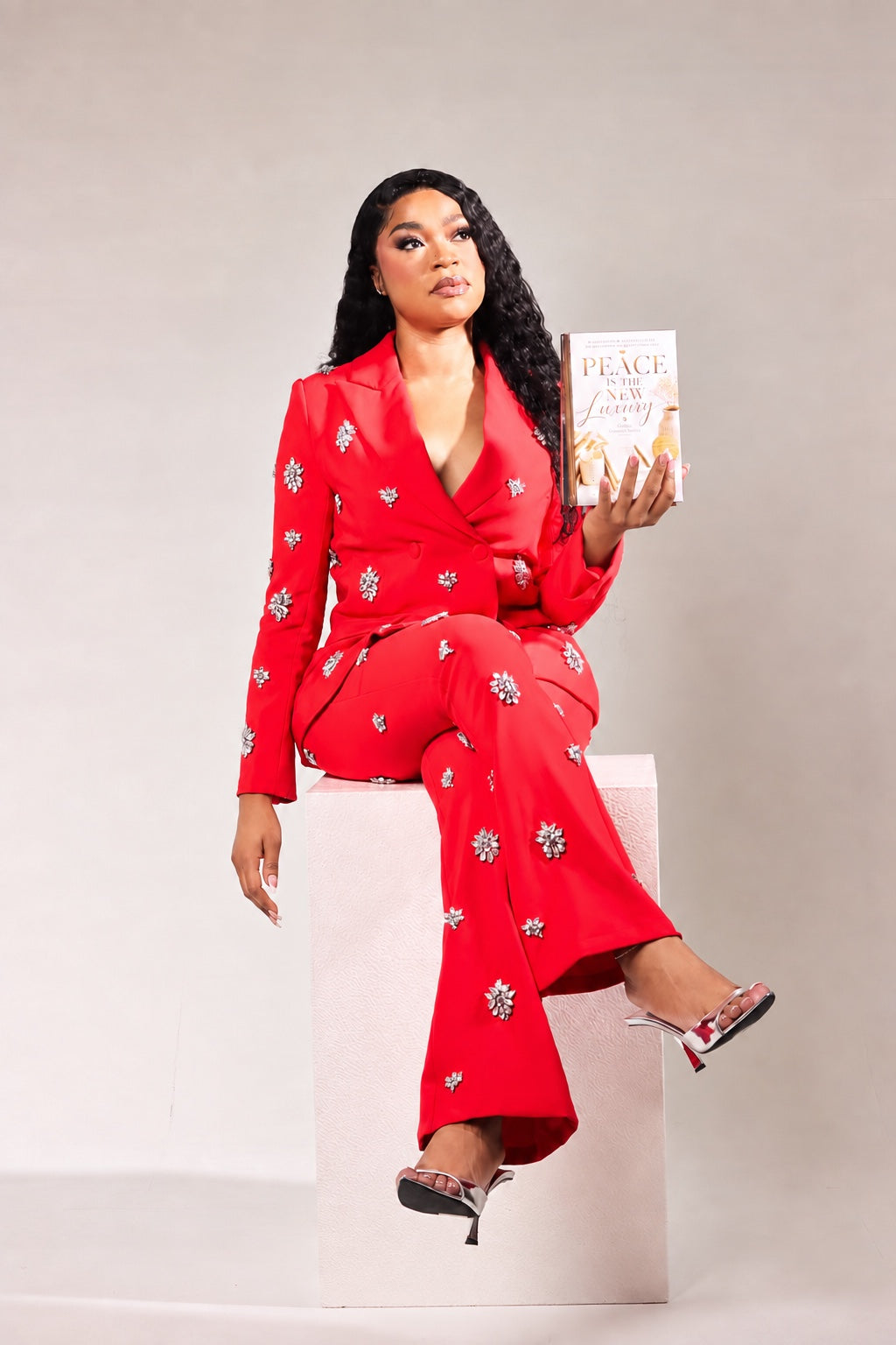 Rachelle Aurisma holding Peace Is the New Luxury